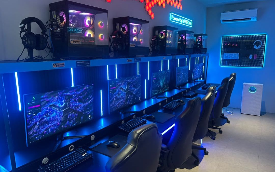 Battlezone: a row of RTX 4070 Super PCs with Logitech G Pro gear under blue desk lighting